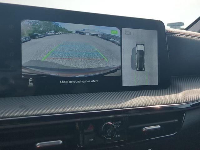 Photo of 2025 Scarlet Ember Tintcoat Nissan Kicks