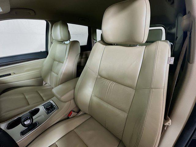 Photo of 2014 Black Forest Green Pearlcoat Jeep Grand Cherokee