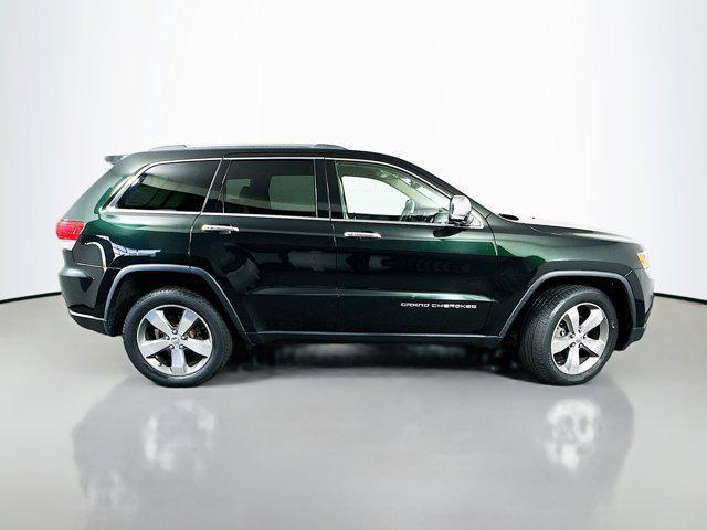 Photo of 2014 Black Forest Green Pearlcoat Jeep Grand Cherokee