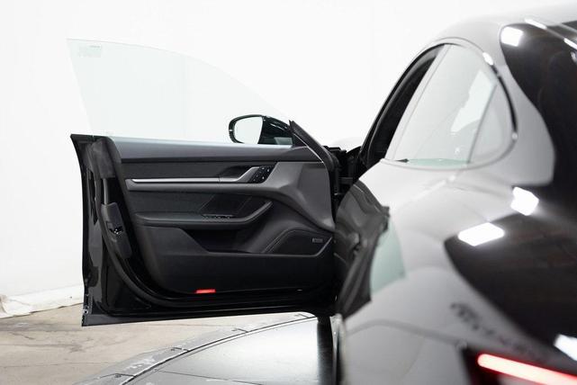Photo of 2024 Jet Black Metallic Porsche Taycan