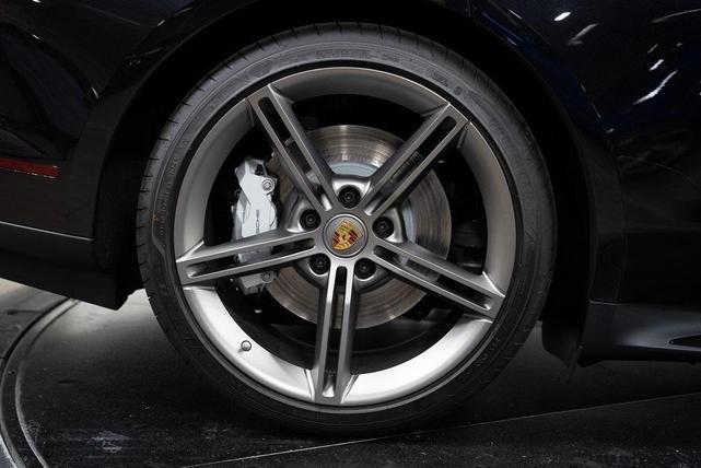 Photo of 2024 Jet Black Metallic Porsche Taycan