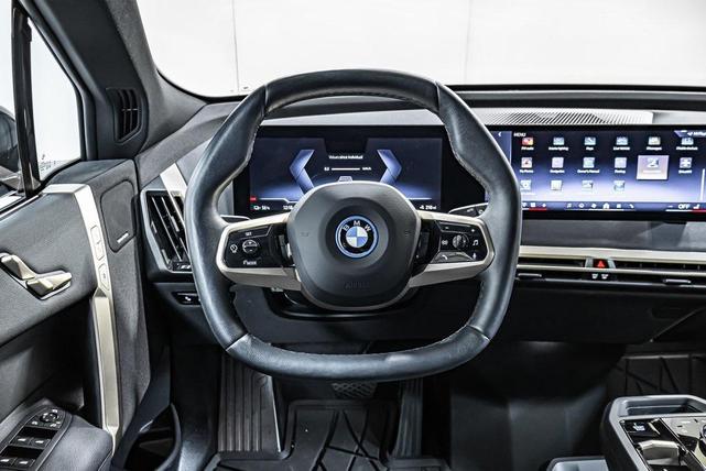 Photo of 2025 Black Sapphire Metallic BMW iX