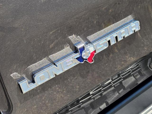 Photo of 2025 Granite Crystal Clearcoat Metallic RAM 1500