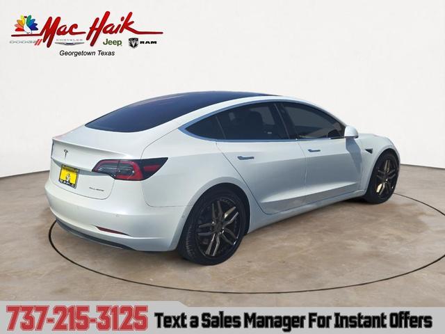 Photo of 2018 Silver Tesla Model 3