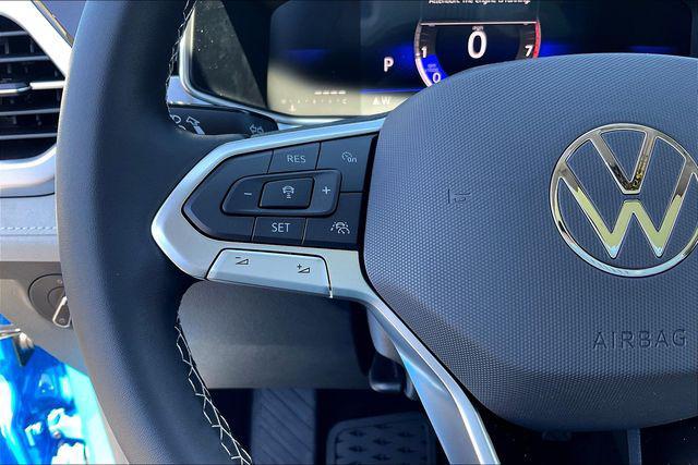 Photo of 2025 Cornflower Blue Volkswagen Taos