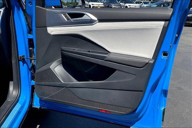 Photo of 2025 Cornflower Blue Volkswagen Taos