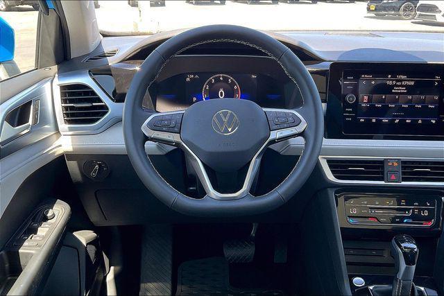 Photo of 2025 Cornflower Blue Volkswagen Taos
