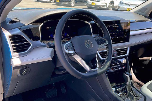 Photo of 2025 Cornflower Blue Volkswagen Taos