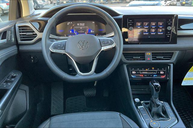 Photo of 2025 Pure White w/Deep Black Roof Volkswagen Taos