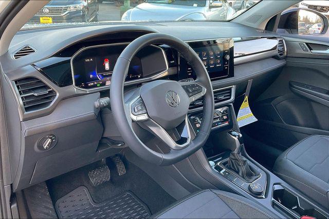Photo of 2025 Pure White w/Deep Black Roof Volkswagen Taos