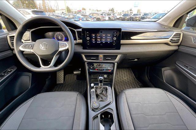 Photo of 2025 Pure White w/Deep Black Roof Volkswagen Taos