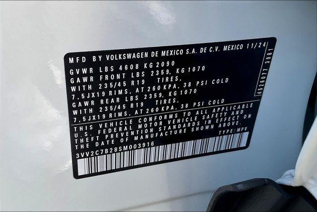 Photo of 2025 Pure White w/Deep Black Roof Volkswagen Taos