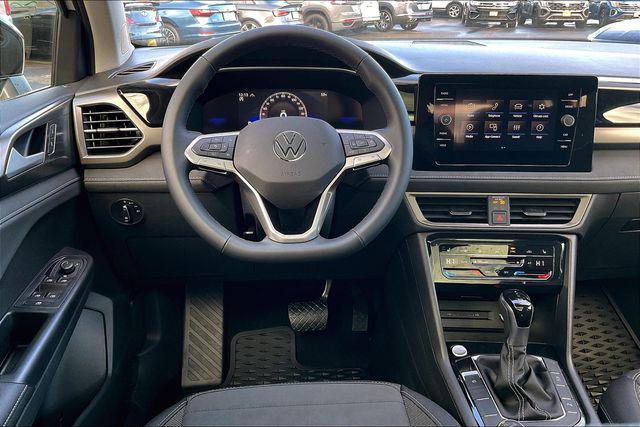 Photo of 2025 Pure White w/Deep Black Roof Volkswagen Taos