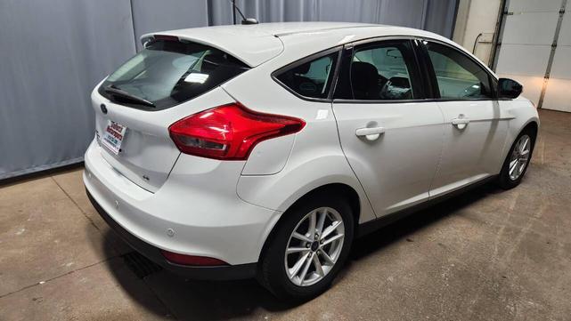 Photo of 2015 White Ford Focus