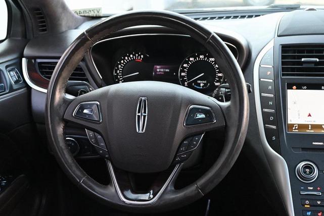 Photo of 2016 Confidential White Tri-Coat Lincoln MKC