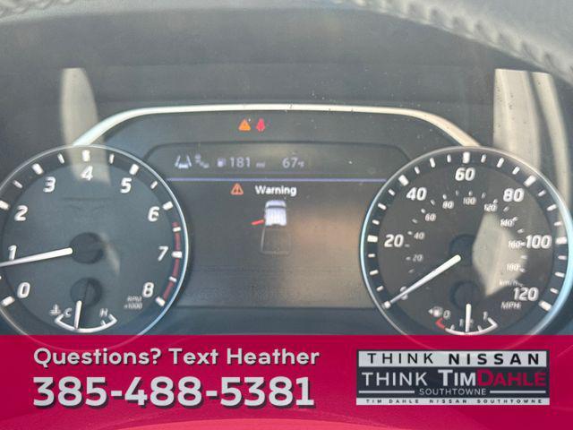 Photo of 2023 Glacier White Nissan Titan