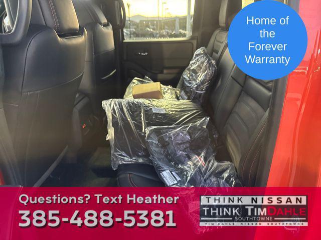 Photo of 2025 Afterburn Orange Nissan Frontier