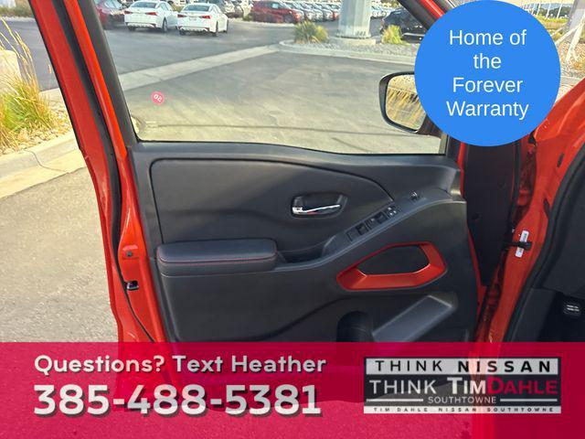 Photo of 2025 Afterburn Orange Nissan Frontier