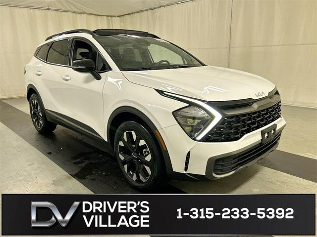 Photo of 2023 Glacial White Pearl Kia Sportage