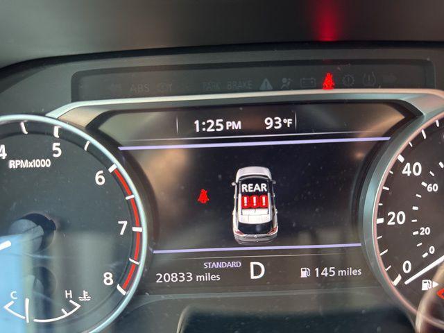 Photo of 2023 Pearl White Tricoat Nissan Rogue