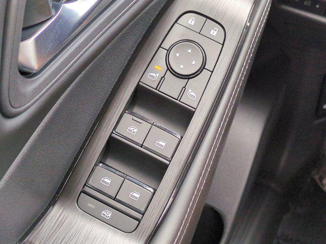 Photo of 2025 Scarlet Ember Tintcoat Nissan Rogue