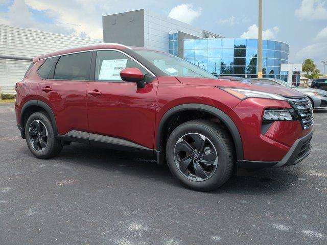 Photo of 2025 Scarlet Ember Tintcoat Nissan Rogue