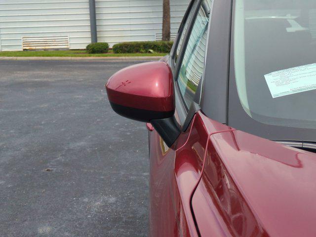 Photo of 2025 Scarlet Ember Tintcoat Nissan Rogue