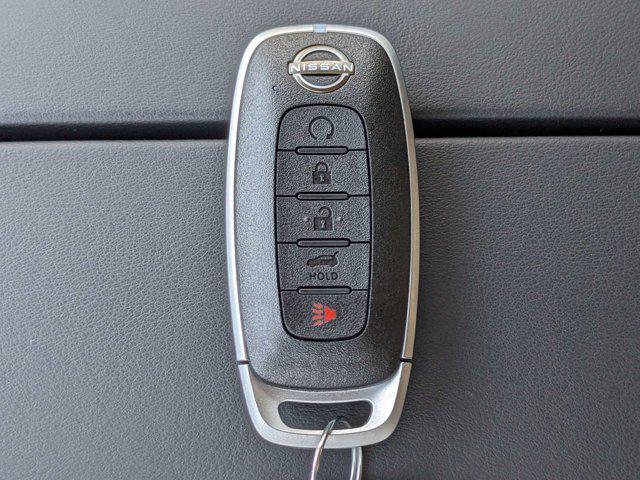 Photo of 2025 Scarlet Ember Tintcoat Nissan Rogue