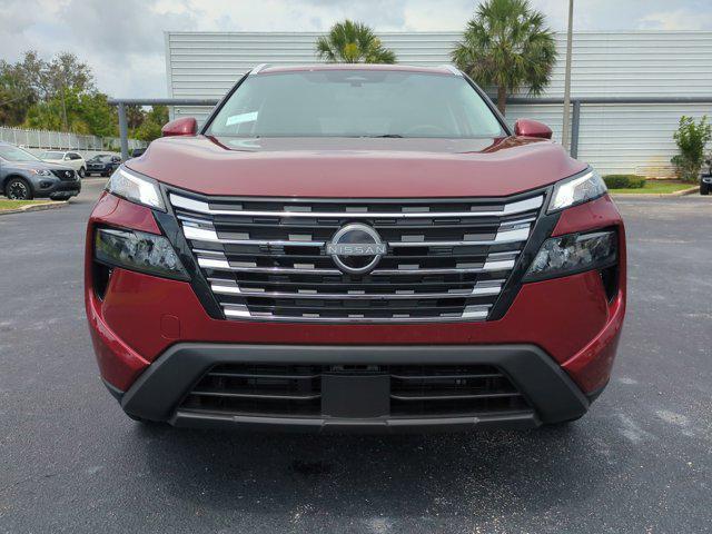 Photo of 2025 Scarlet Ember Tintcoat Nissan Rogue