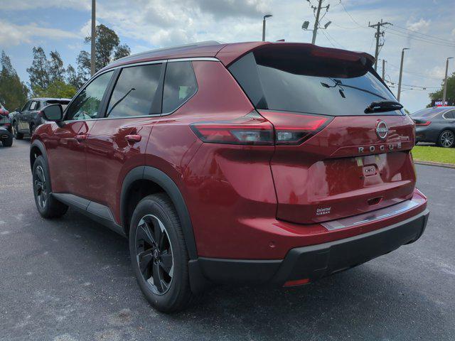 Photo of 2025 Scarlet Ember Tintcoat Nissan Rogue