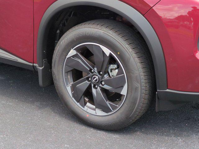 Photo of 2025 Scarlet Ember Tintcoat Nissan Rogue