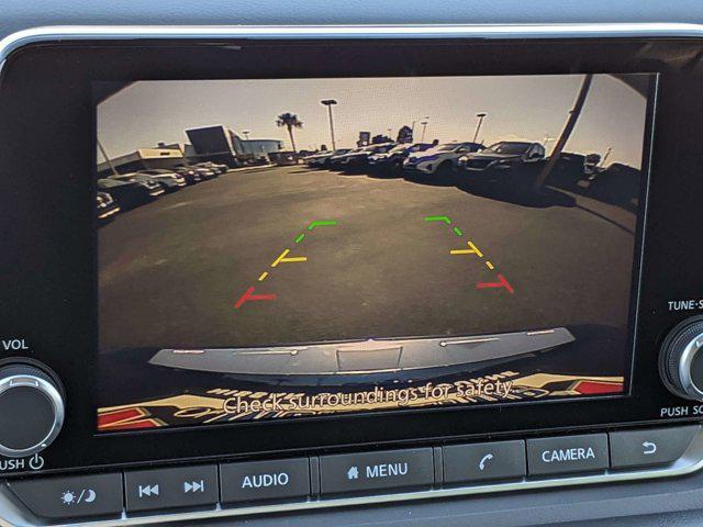 Photo of 2025 Scarlet Ember Tintcoat Nissan Rogue