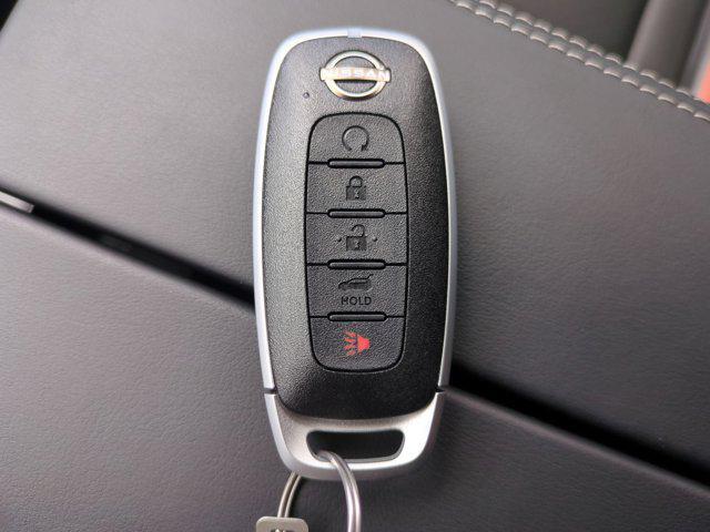 Photo of 2025 Scarlet Ember Tintcoat Nissan Rogue