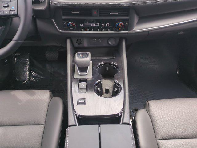 Photo of 2025 Scarlet Ember Tintcoat Nissan Rogue