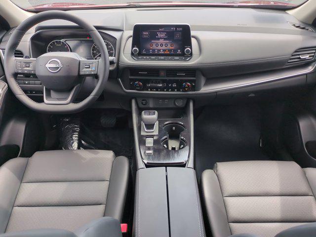Photo of 2025 Scarlet Ember Tintcoat Nissan Rogue