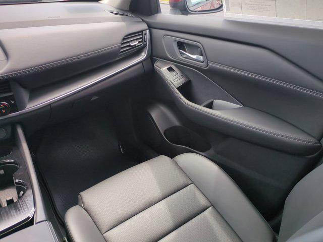 Photo of 2025 Scarlet Ember Tintcoat Nissan Rogue