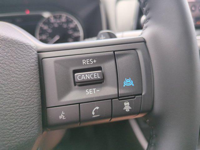 Photo of 2025 Scarlet Ember Tintcoat Nissan Rogue