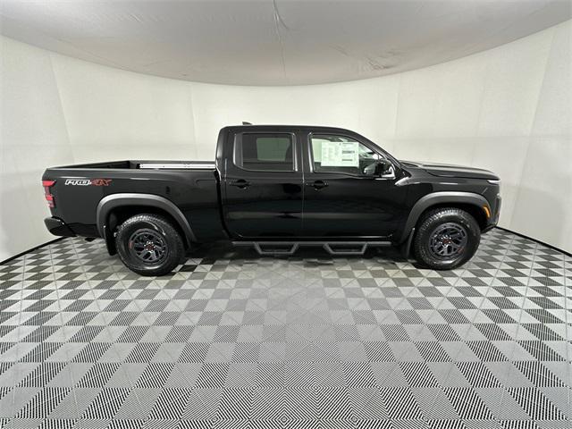 Photo of 2026 Super Black Nissan Frontier