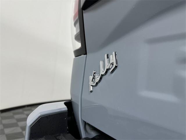 Photo of 2025 Boulder Gray Pearl Nissan Frontier