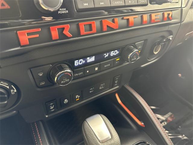 Photo of 2025 Boulder Gray Pearl Nissan Frontier