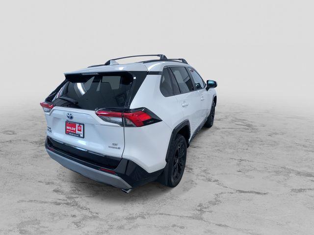 Photo of 2023 White Toyota RAV4 Hybrid