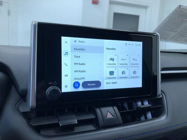 Photo of 2023 White Toyota RAV4 Hybrid