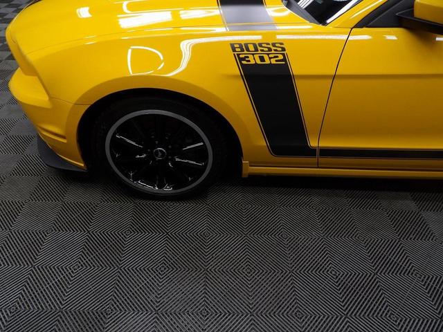 Photo of 2013 School Bus Yellow Ford Mustang