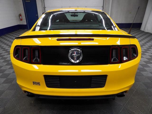 Photo of 2013 School Bus Yellow Ford Mustang