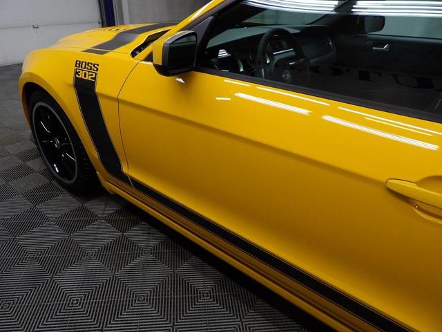 Photo of 2013 School Bus Yellow Ford Mustang