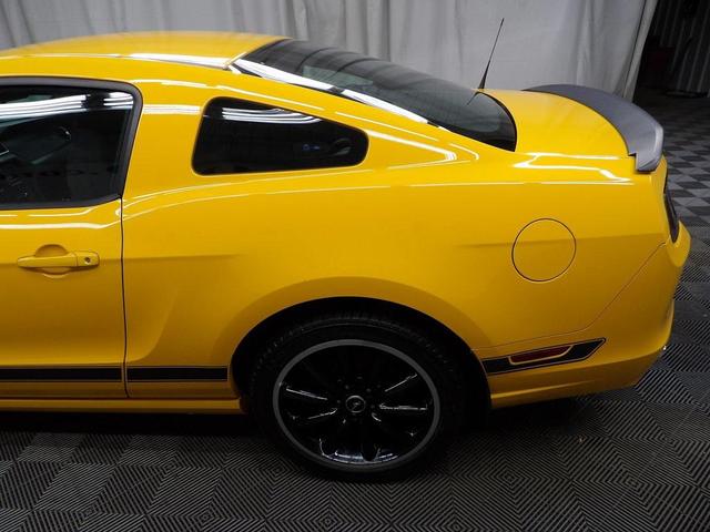 Photo of 2013 School Bus Yellow Ford Mustang