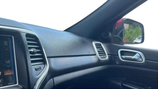 Photo of 2015 Deep Cherry Red Crystal Pearlcoat Jeep Grand Cherokee