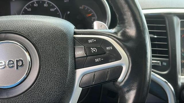 Photo of 2015 Deep Cherry Red Crystal Pearlcoat Jeep Grand Cherokee