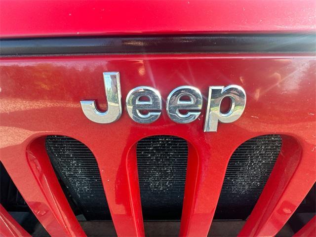 Photo of 2014 Flame Red Clearcoat Jeep Wrangler Unlimited