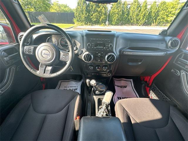 Photo of 2014 Flame Red Clearcoat Jeep Wrangler Unlimited